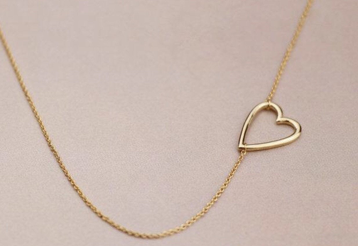 Sideways Heart Necklace: available in silver, gold, and rose gold.