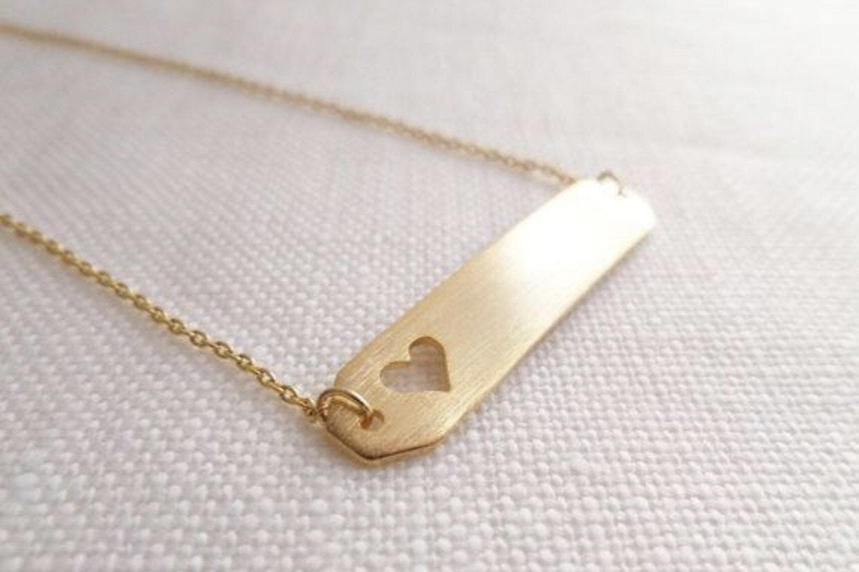 Open Heart Bar Necklace: available in silver, , and rose gold.